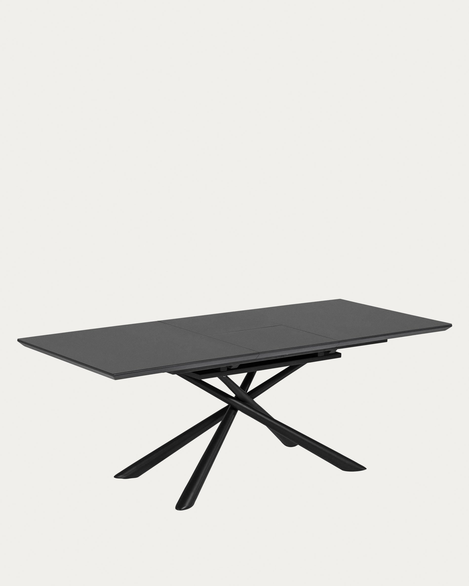 Moderner Ausziehtisch mit Glasplatte und schwarzen Stahlbeinen, ideal für stilvolle Esszimmer, Masse 160-210 x 90 cm.