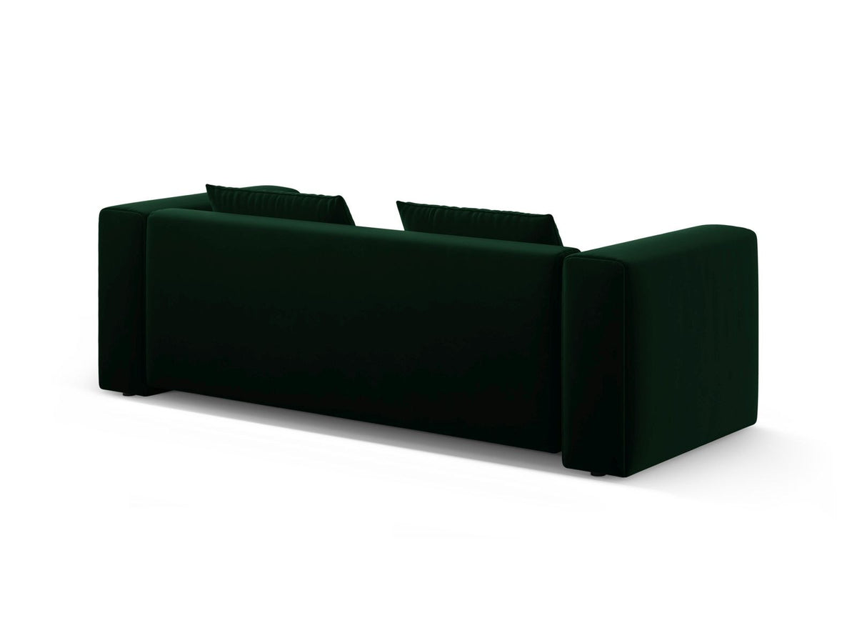 Sandfarbenes Samt-Bettsofa Verona mit drei Sitzplätzen, ausklappbarer Liegefläche, Bettkasten und schwarzen Kunststoffbeinen im Wohnraum.