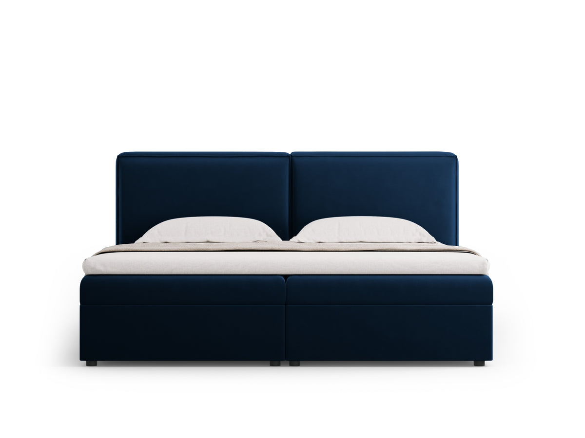 Gepolstertes Boxspring-Bett Arendal mit Kopfteil in Stoffbezug auf schwarzen Kunststoffbeinen