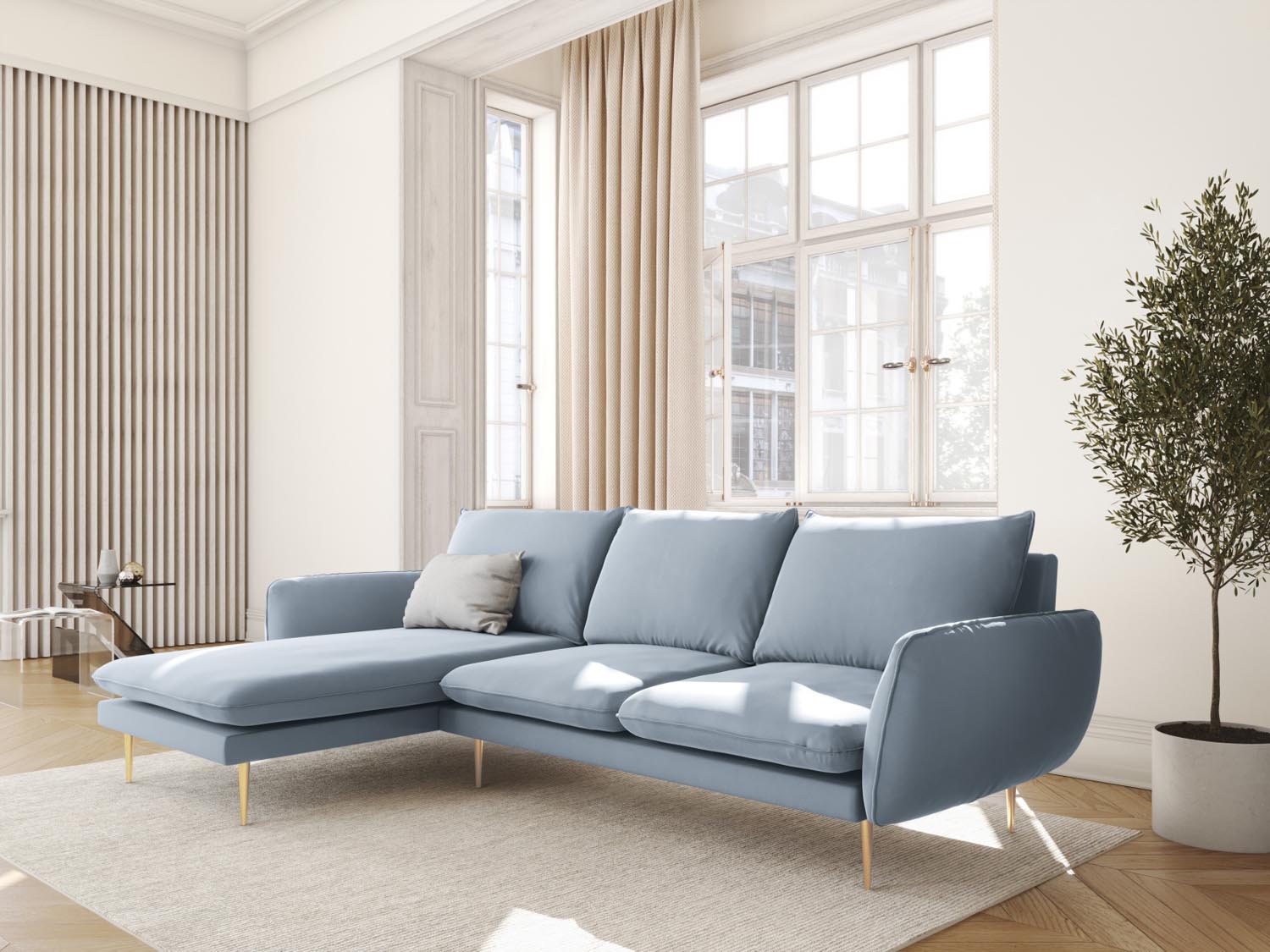 Elegantes Vienna Velour Ecksofa links in sanftem Hellblau, ideal für stilvolle Wohnräume, präsentiert in einem modernen Ambiente.