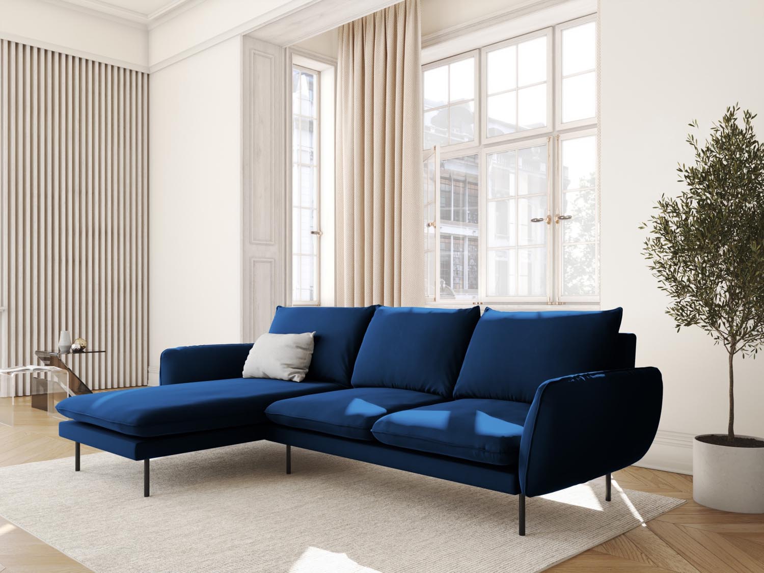 Elegantes Vienna Velour Ecksofa links in Royal Blue/Schwarz-Bluvel, ideal für stilvolle Wohnräume, präsentiert in modernem Ambiente.