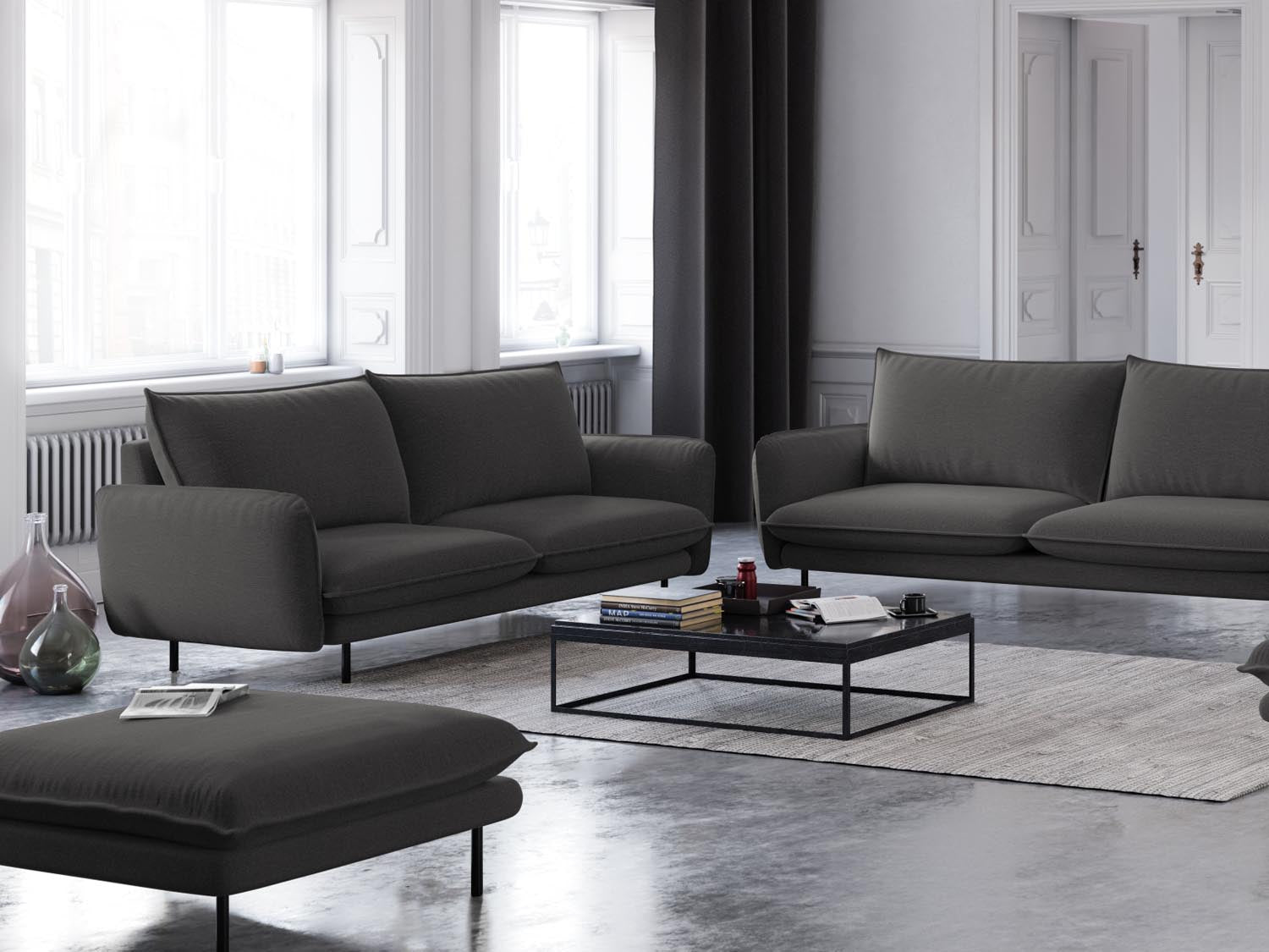 Eleganter Vienna Pouf in Dunkelgrau/Schwarz, ideal für stilvolle Wohnräume. Perfekt als Sitzgelegenheit oder dekoratives Element.