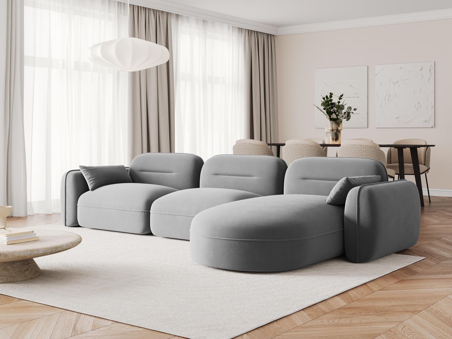 Elegantes Sydney Velour Ecksofa in hellem Grau, ideal für stilvolle Wohnräume. Modular und bequem, perfekt für entspannte Abende.