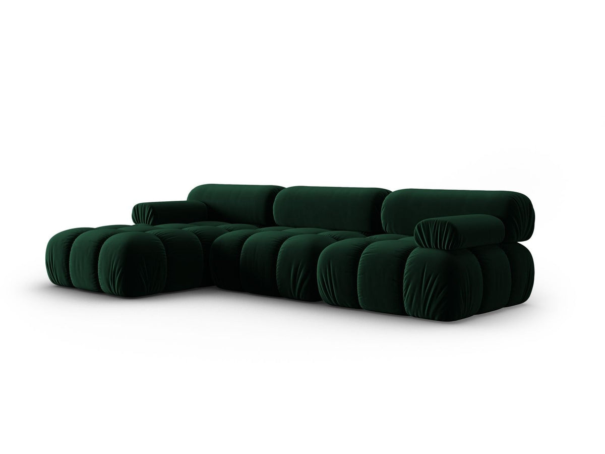 Modulares Ecksofa mit rosa Samtstoff, schwarzen Kunststoffbeinen und gepolsterter Récamiere, Ansicht von vorne links.