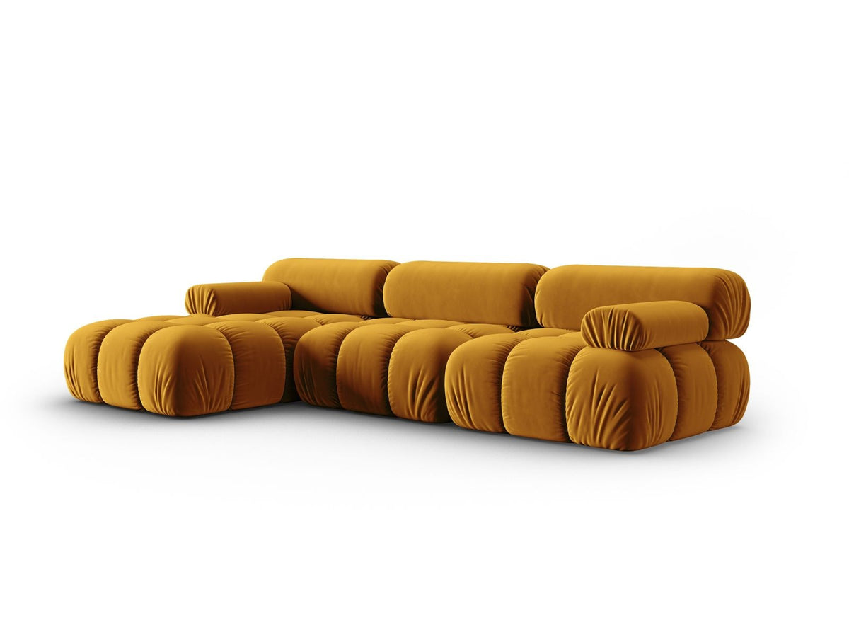 Modulares Ecksofa mit rosa Samtstoff, schwarzen Kunststoffbeinen und gepolsterter Récamiere, Ansicht von vorne links.