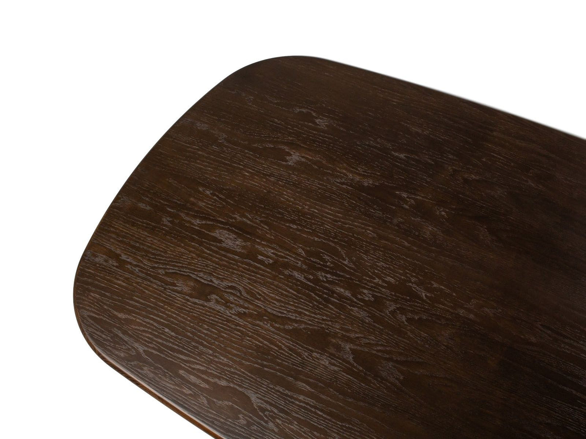 Esstisch aus Holz mit Eichenfurnier in Schwarz, rechteckige Tischplatte mit Holzbeinen, Ansicht von der Seite.