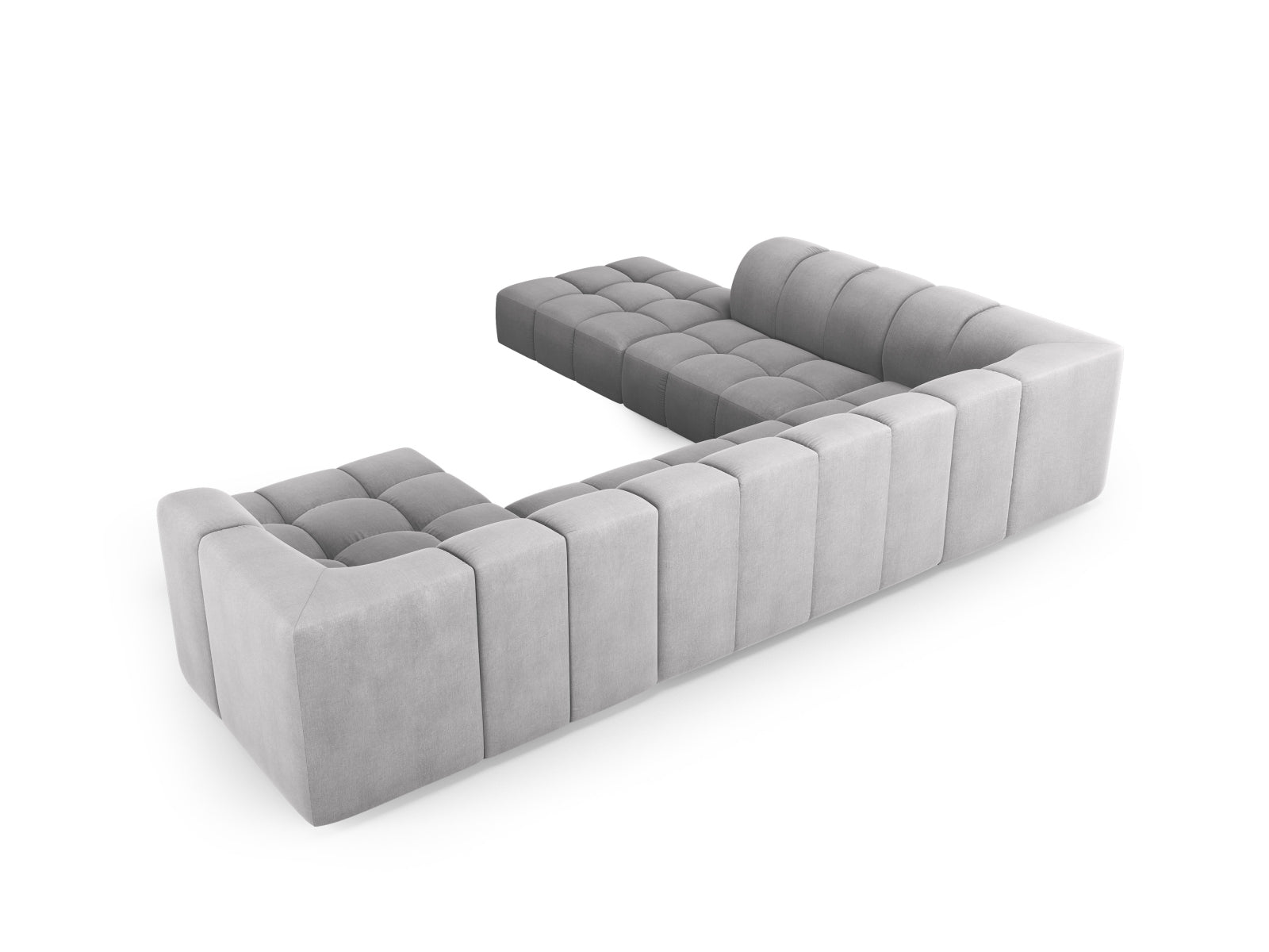 Geräumiges 7-Sitzer Ecksofa Moritz in elegantem Hellgrau, perfekt für stilvolle Wohnzimmer, umgeben von harmonischer Einrichtung.