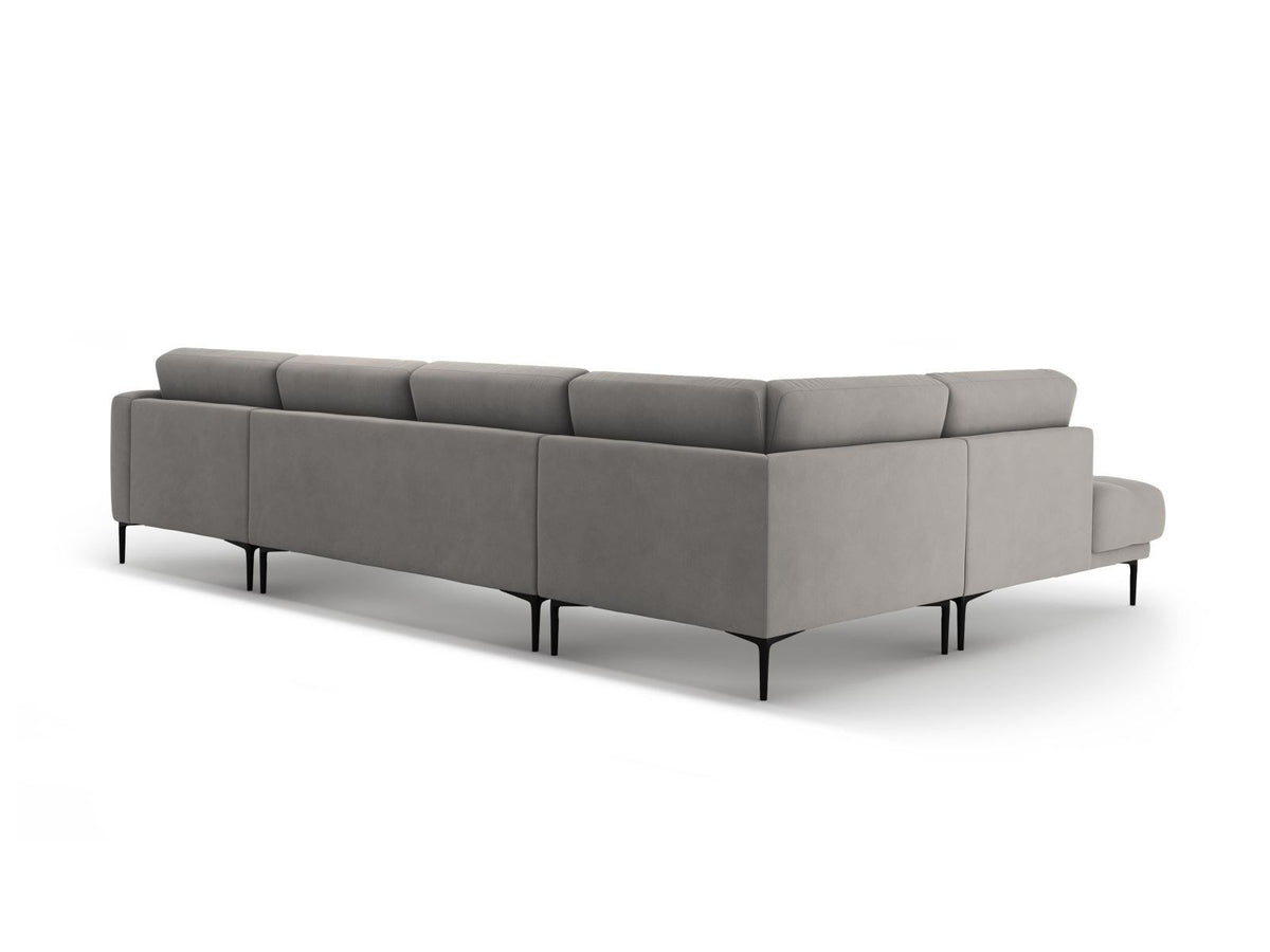 Grünes Samt-Panorama-Ecksofa links mit schwarzen Metallbeinen, grosser Sitzfläche und Récamiere, Modell Lazio von Cosmopolitan Design.