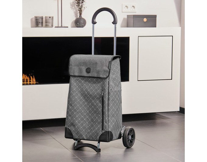 Schwarzer Einkaufstrolley ANDERSEN Scala Sofia mit textiler Tasche, Aussentasche, Überschlag und zwei Rädern auf klappbarem Metallgestell.