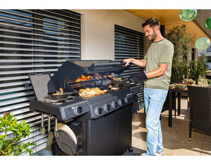 RÖSLE Gasgrill Allflame Hero 6 in Schwarz mit sechs Brennern, Seitentisch, Glaseinsatz im Deckel und emailliertem Gusseisen-Grillrost.