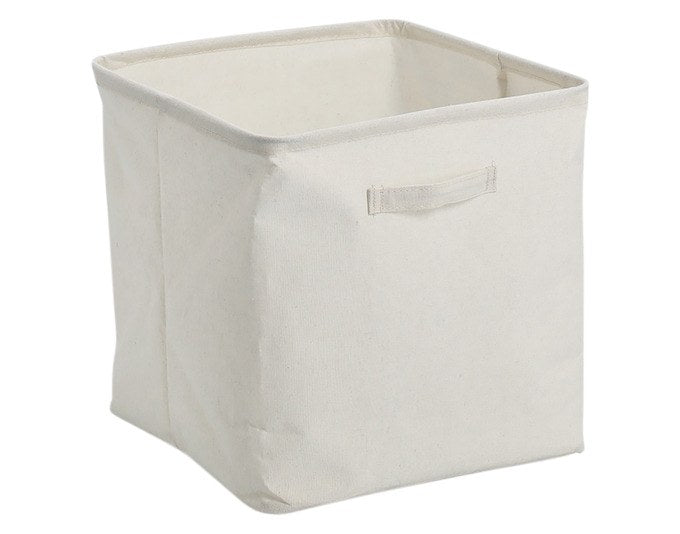 Cremefarbene Aufbewahrungsbox aus Polyestergewebe mit rechteckiger Form, formstabil, auf hellem Untergrund fotografiert.