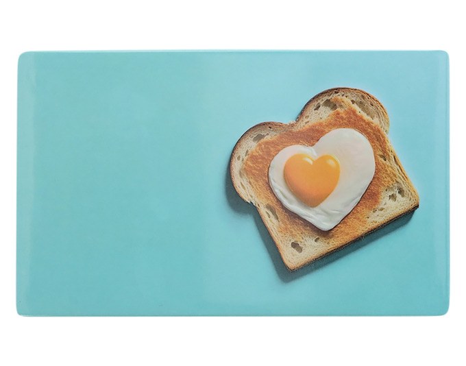 Türkisfarbenes Frühstücksbrettchen Happy Toast aus Melamin, rechteckige Form, Grösse 23.3x14.3x0.3 cm, von ZELLER PRESENT.