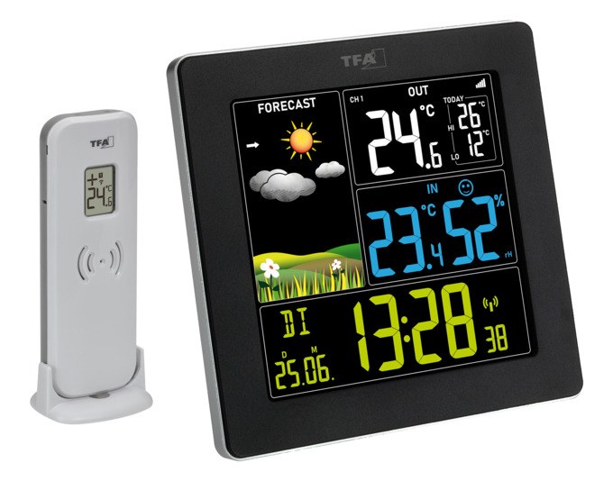Schwarze TFA Funk-Wetterstation Sun 2 mit farbigem Display, stehend aufgestellt, zeigt Temperatur, Luftfeuchtigkeit und Wettersymbole an.
