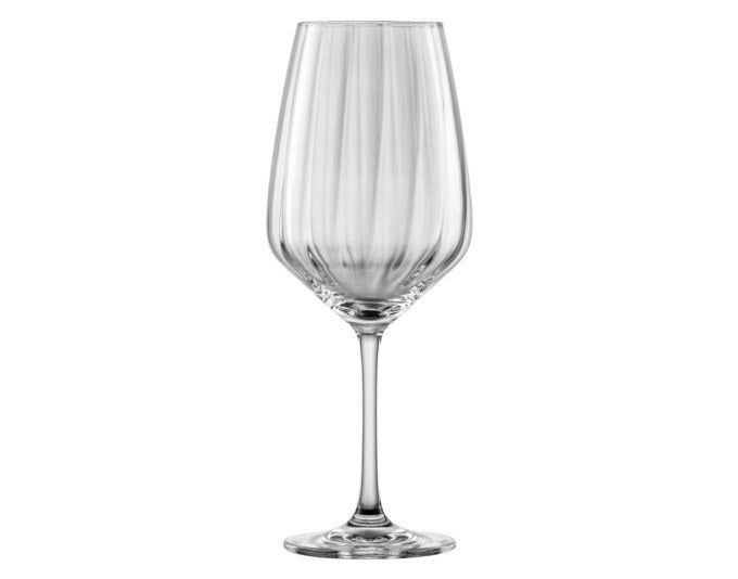 Vier transparente SCHOTT ZWIESEL Trinkgläser Blossom aus Tritan Kristallglas mit blütenartig geöffneter Kelchform und strukturierter Oberfläche.
