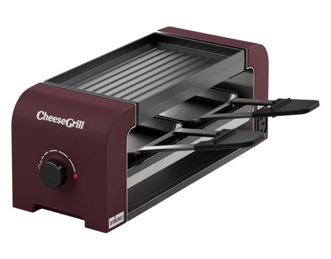 Produktfoto des STÖCKLI CheeseGrill 2 Connect in Merlot Red mit zwei antihaftbeschichteten Pfännchen und wendbarer Aluguss-Grillplatte.