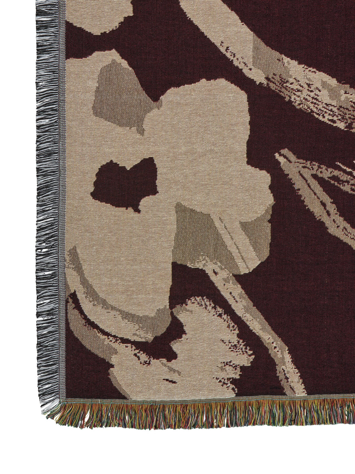 Cilla Wanddecke von Ferm Living in Dunkel Pecan aus 100% Bio-Baumwolle mit handgewebtem Blumenmotiv, Fransen und Tapisserie-Webstruktur.