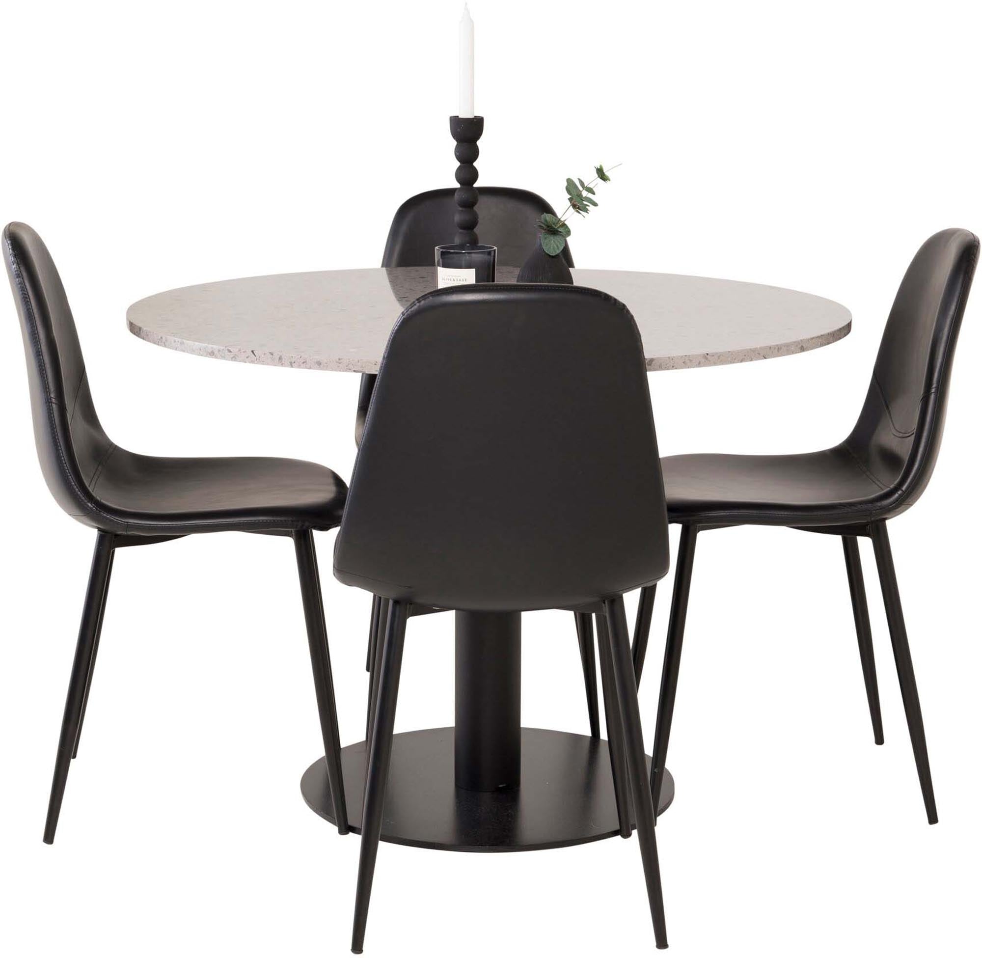 Stilvolles Esszimmerset mit runder marmorierter Tischplatte und luxuriösen Samtstühlen. Perfekt für moderne Wohnkonzepte und gesellige Abende.