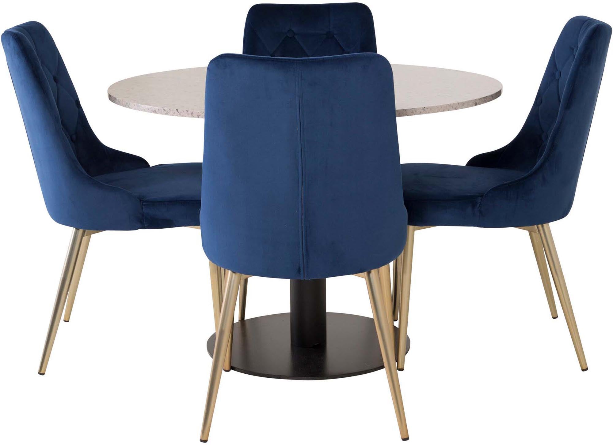 Stilvolles Esszimmerset mit einem eleganten Tisch und vier bequemen Samtstühlen, perfekt für gesellige Runden und festliche Anlässe.