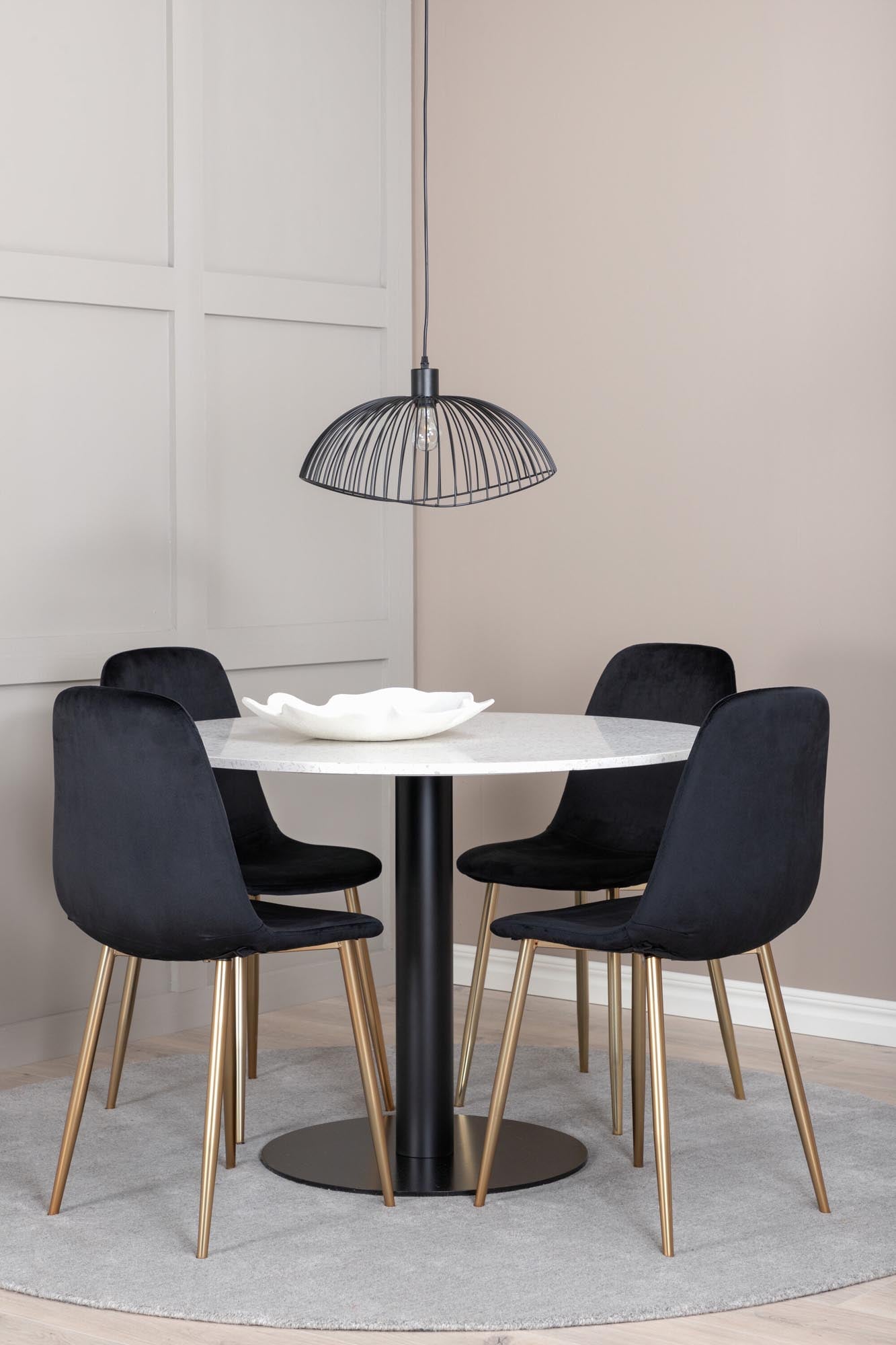 Erleben Sie das Razzia Esszimmerset + Polar von Venture Home: Ein stilvoller runder Tisch mit pflegeleichter marmorierter Platte und bequemen Samtstühlen für Ihr modernes Zuhause.