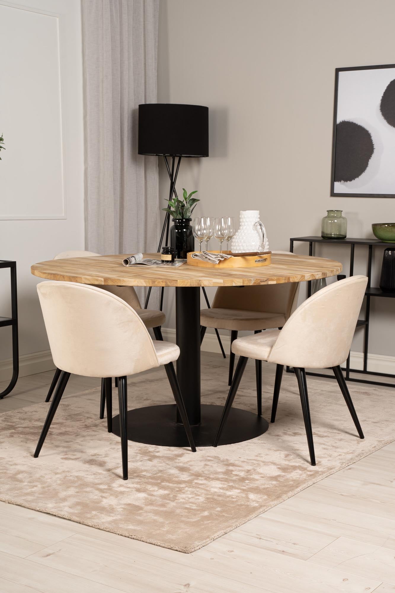 Stilvolles Cirebon Esszimmerset: 140 cm runder Teakholztisch und 4 luxuriöse Samtstühle. Ideal für gesellige Abende und elegantes Ambiente.