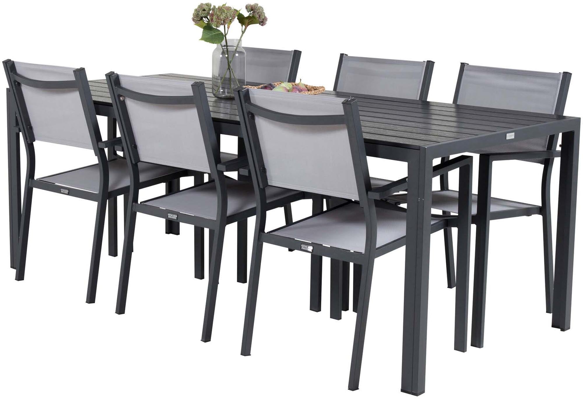 Stilvolles Outdoor-Tischset für 6 Personen von Venture Home. Wetterfester Esstisch und bequeme Copacabana Armstühle für unvergessliche Momente.