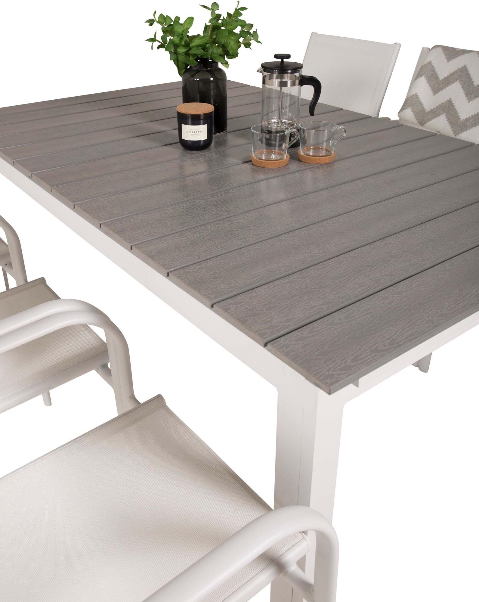 Ausziehbares Levels Outdoor-Tischset von Venture Home: Ideal für gesellige Runden im Freien mit eleganten Santorini-Stühlen.