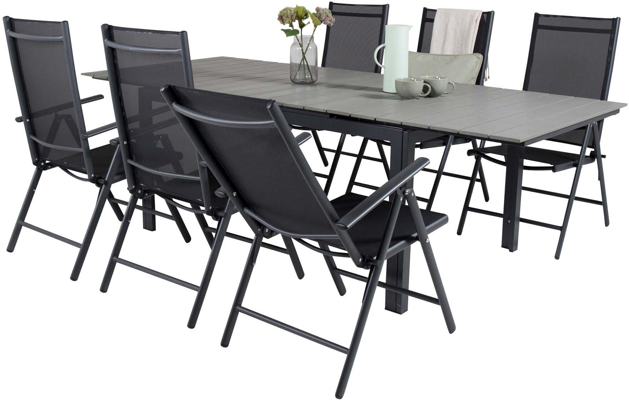 Stilvolles und flexibles Outdoor-Tischset mit ausziehbarem Esstisch und bequemen, klappbaren Stühlen für unvergessliche Momente im Freien.