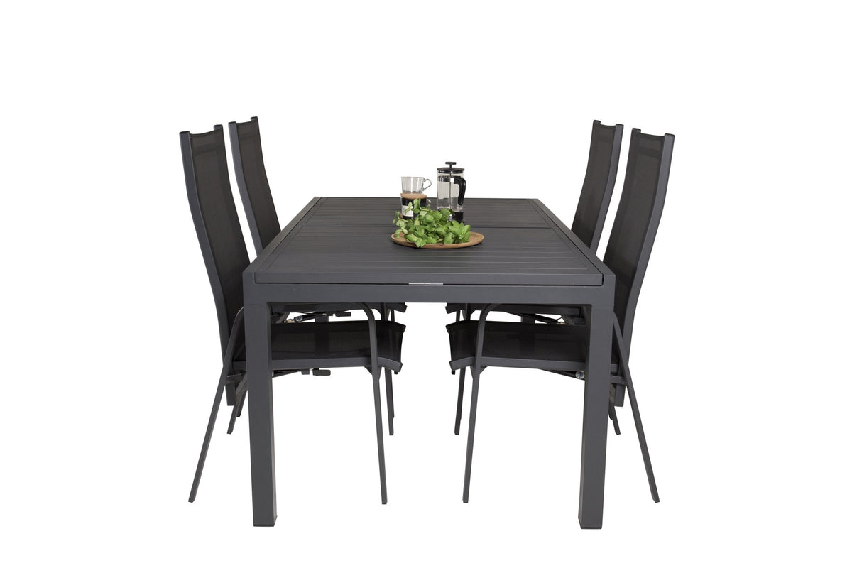 Schwarzes Aluminium-Gartentischset Marbella mit ausziehbarer Tischplatte und acht pulverbeschichteten Copacabana-Stühlen im Outdoor-Bereich