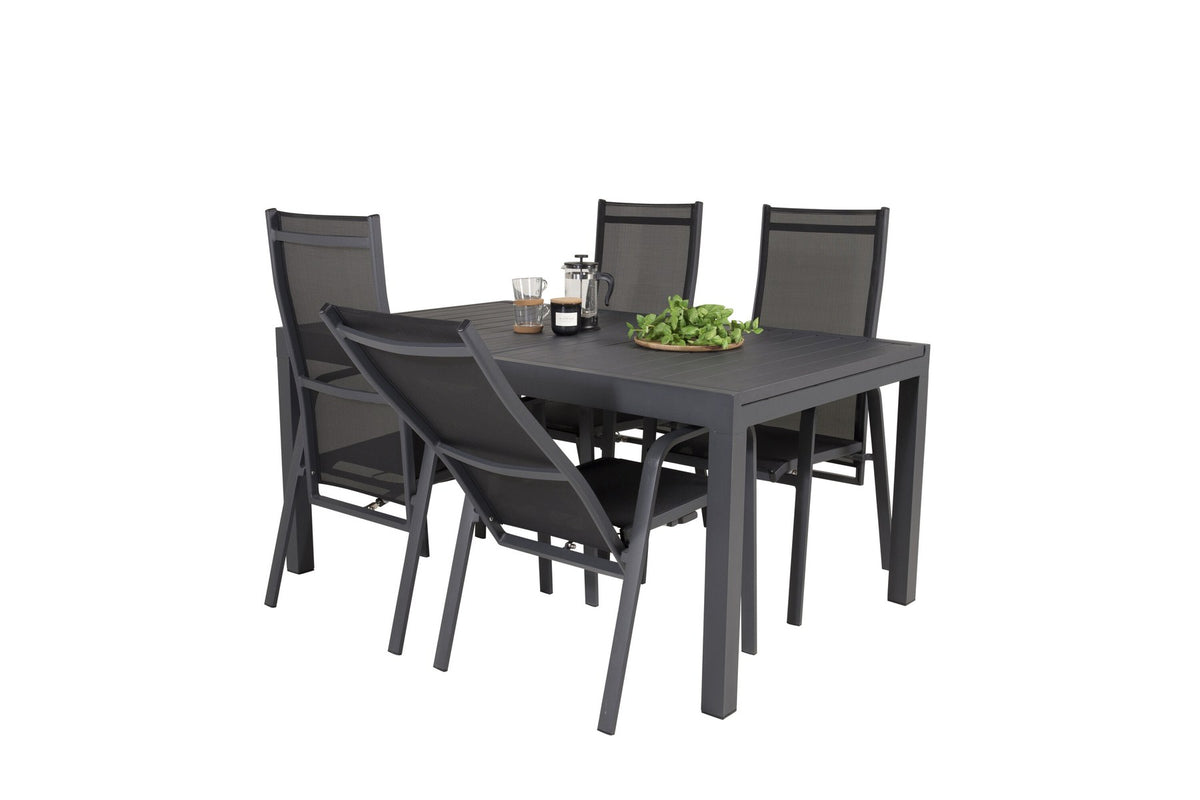 Schwarzes Aluminium-Gartentischset Marbella mit ausziehbarer Tischplatte und acht pulverbeschichteten Copacabana-Stühlen im Outdoor-Bereich