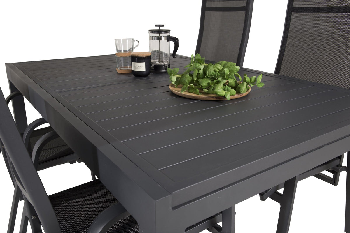 Schwarzes Aluminium-Gartentischset Marbella mit ausziehbarer Tischplatte und acht pulverbeschichteten Copacabana-Stühlen im Outdoor-Bereich