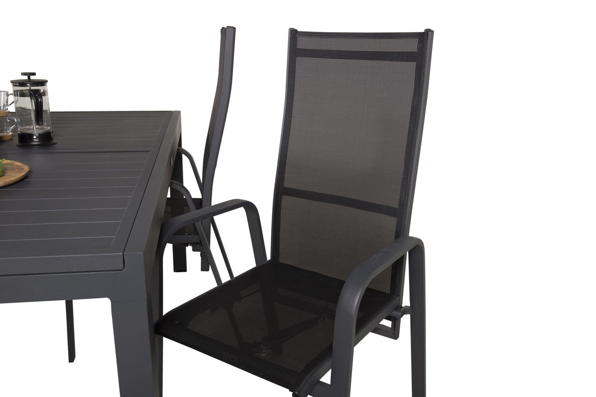 Schwarzes Aluminium-Gartentischset Marbella mit ausziehbarer Tischplatte und acht pulverbeschichteten Copacabana-Stühlen im Outdoor-Bereich