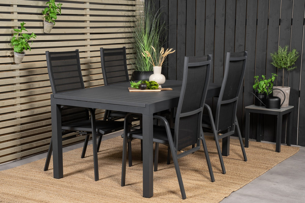 Schwarzes Aluminium-Gartentischset Marbella mit ausziehbarer Tischplatte und acht pulverbeschichteten Copacabana-Stühlen im Outdoor-Bereich