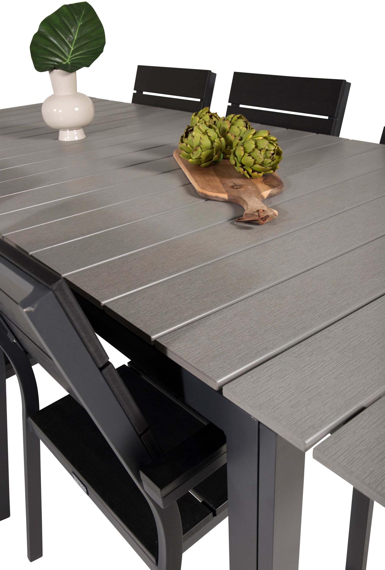 Stilvolles 224 cm Gartentischset für 6 Personen, ideal für gesellige Abende im Freien. Hochwertiges Aintwood für Langlebigkeit und Komfort.