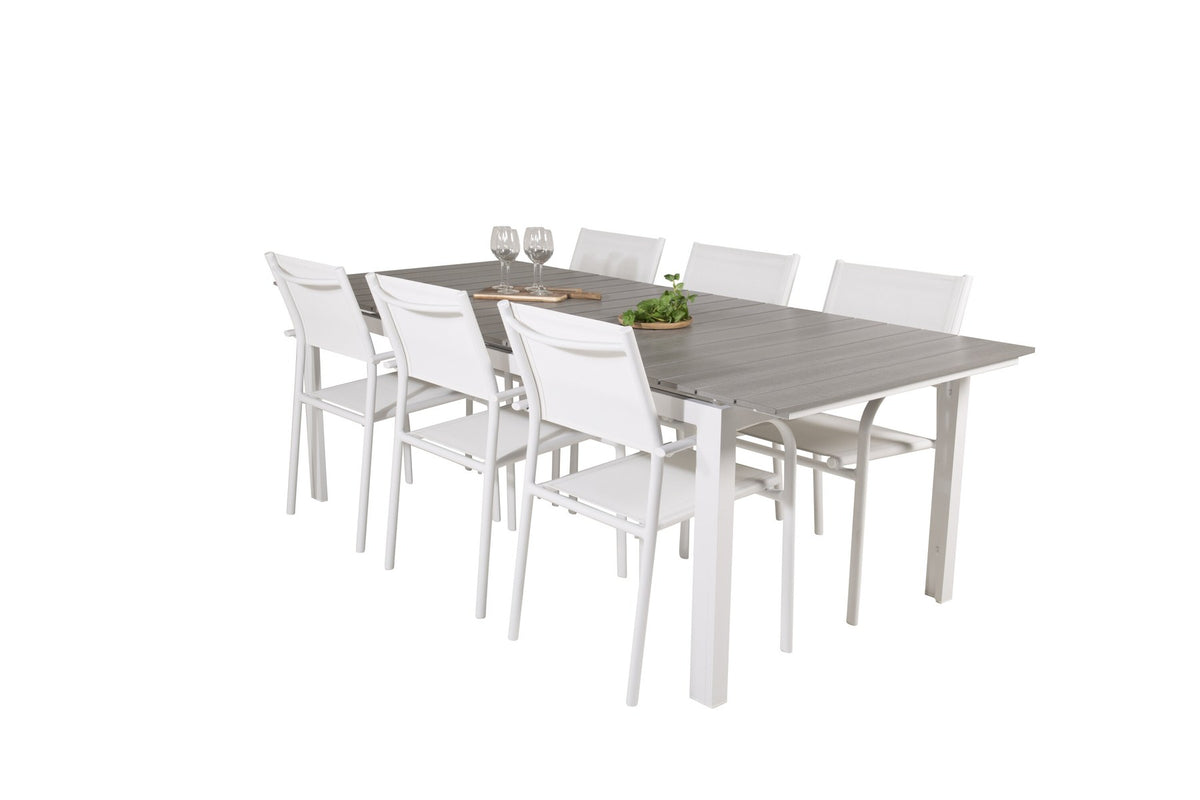 Weisses Gartentischset Levels & Santorini von Venture Home: rechteckiger Esstisch aus Aluminium und Aintwood mit stapelbaren Stühlen in Weiss.