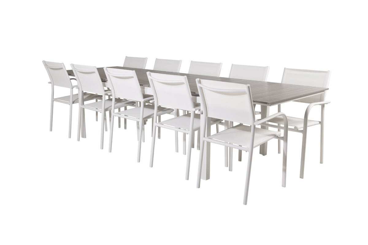 Weisses Gartentischset Levels & Santorini von Venture Home: rechteckiger Esstisch aus Aluminium und Aintwood mit stapelbaren Stühlen in Weiss.