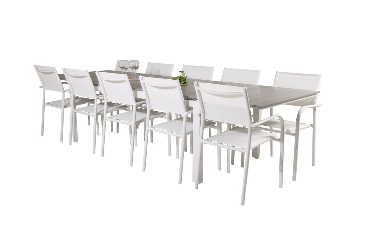 Weisses Gartentischset Levels & Santorini von Venture Home: rechteckiger Esstisch aus Aluminium und Aintwood mit stapelbaren Stühlen in Weiss.