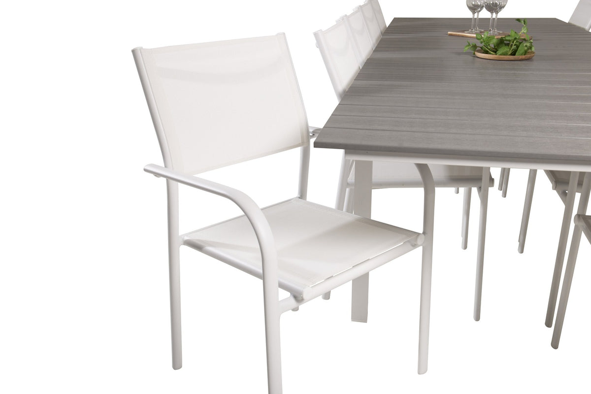 Weisses Gartentischset Levels & Santorini von Venture Home: rechteckiger Esstisch aus Aluminium und Aintwood mit stapelbaren Stühlen in Weiss.