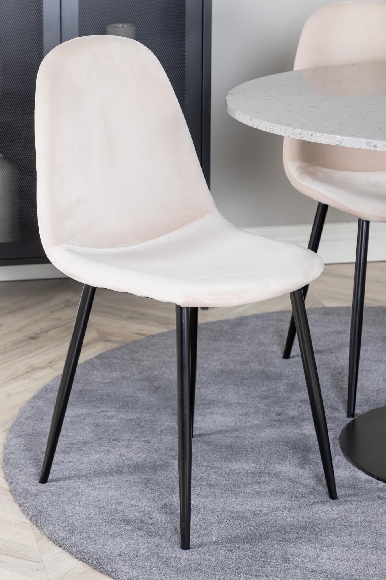 Elegantes Razzia Esszimmerset mit runder, pflegeleichter Tischplatte und luxuriösen Samtstühlen für ein stilvolles Esszimmerambiente.