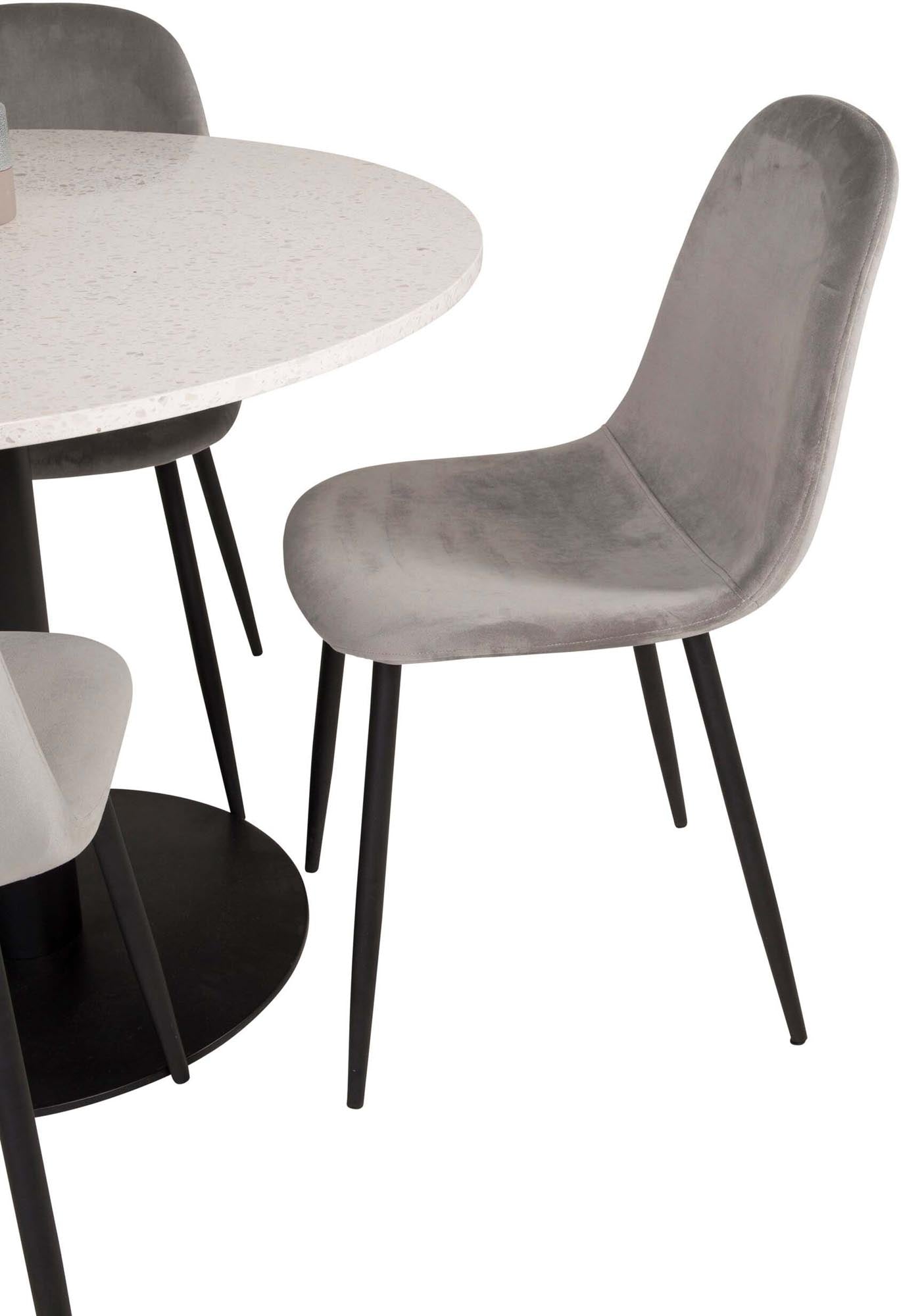 Entdecken Sie das Razzia Esszimmerset + Polar von Venture Home: Eleganz trifft Komfort mit einem runden Tisch und luxuriösen Samtstühlen.