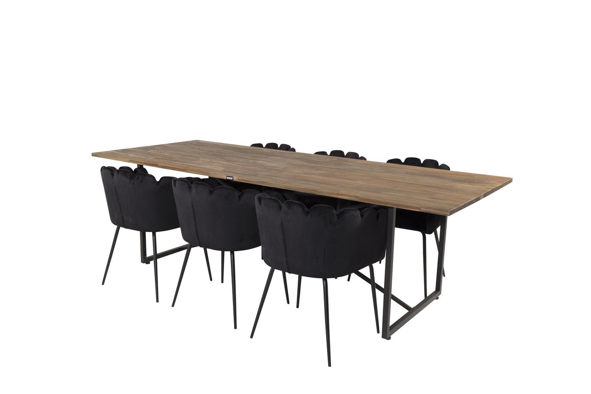 Padang Esstisch mit Teak-Platte und Stahlbeinen, kombiniert mit schwarzen Limhamn Stühlen aus Stahl und Polyester-Samt-Bezug.