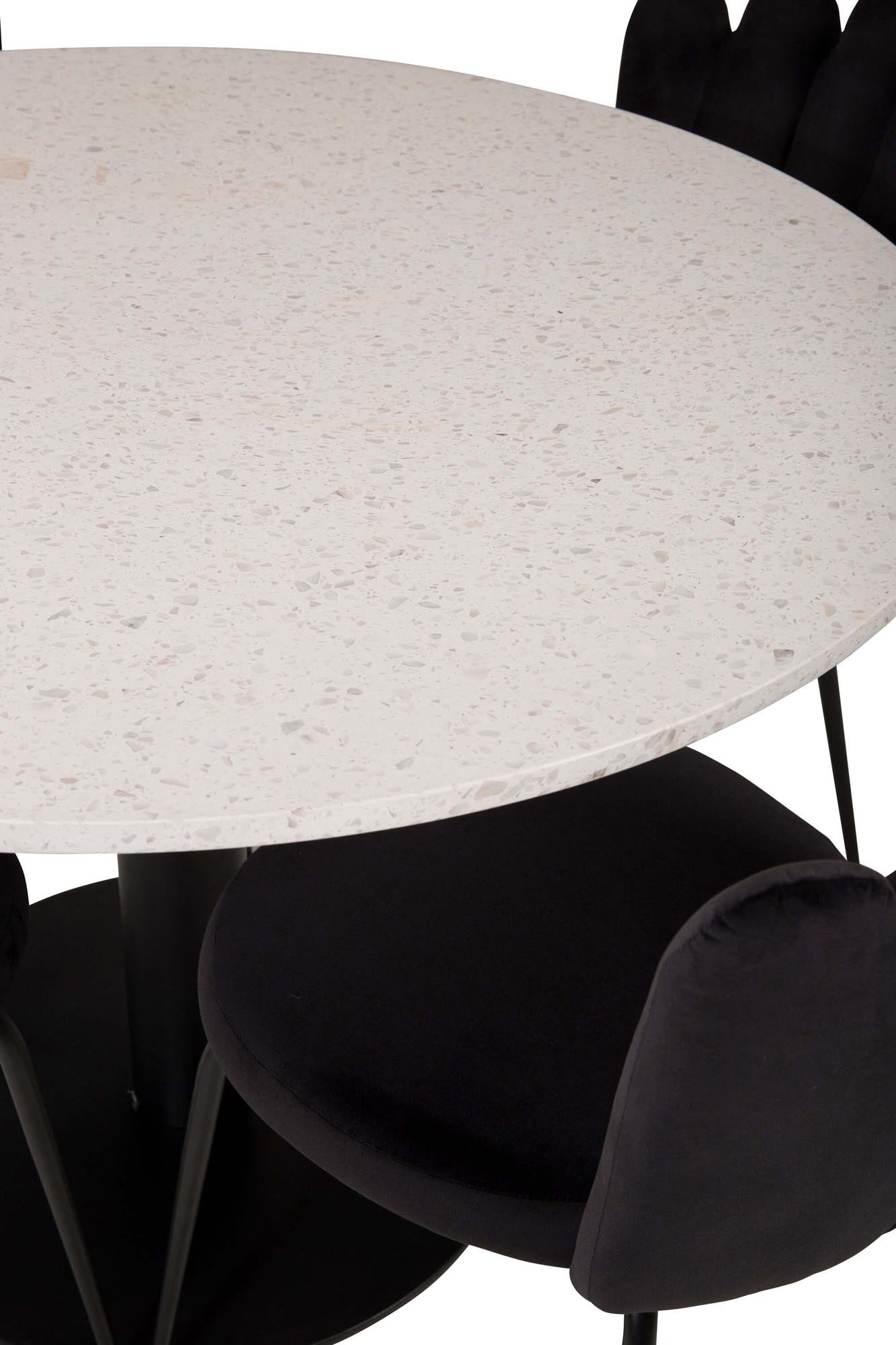 Elegantes Esszimmerset mit runden Terrazzo-Tisch und bequemen Samtstühlen. Ideal für gesellige Abende und stilvolle Einrichtung.