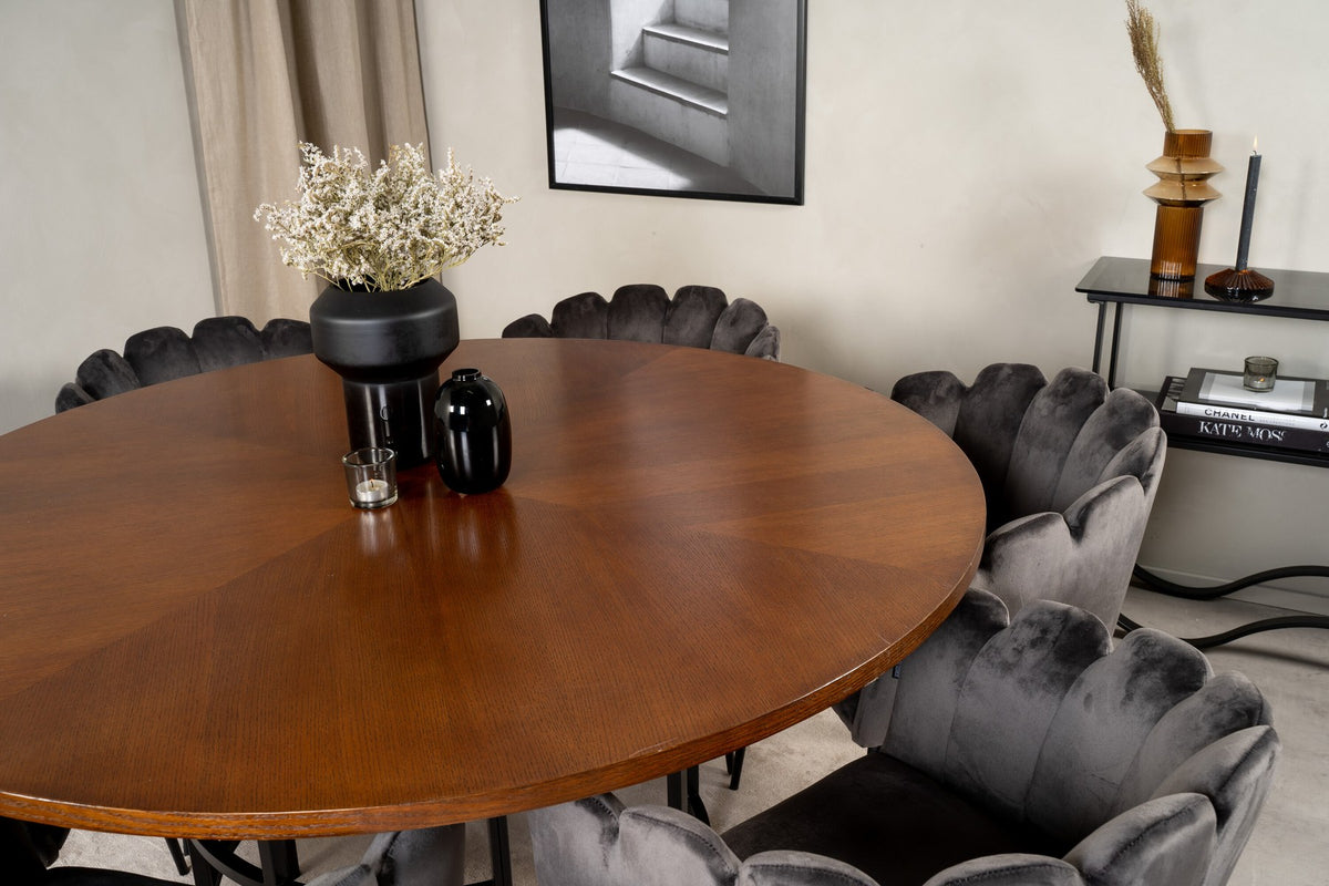 Rundes Esszimmerset Copenhagen von Venture Home mit Tisch aus MDF, Stahl und Furnier sowie Stühlen mit schwarzer Pulverbeschichtung.