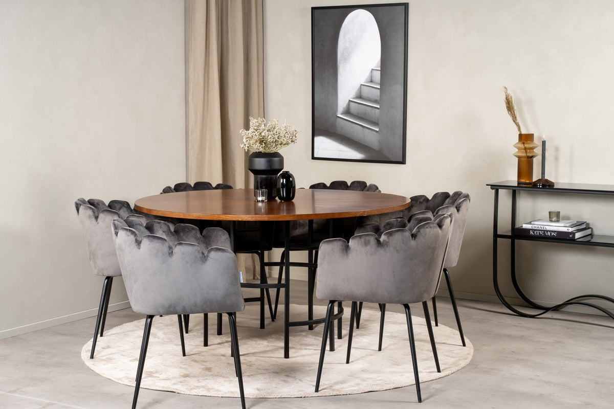 Rundes Esszimmerset Copenhagen von Venture Home mit Tisch aus MDF, Stahl und Furnier sowie Stühlen mit schwarzer Pulverbeschichtung.