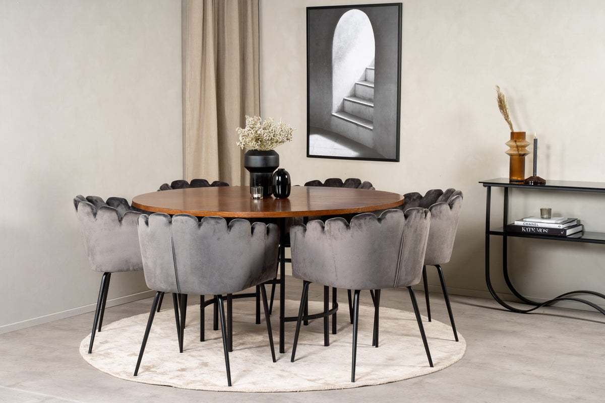 Rundes Esszimmerset Copenhagen von Venture Home mit Tisch aus MDF, Stahl und Furnier sowie Stühlen mit schwarzer Pulverbeschichtung.