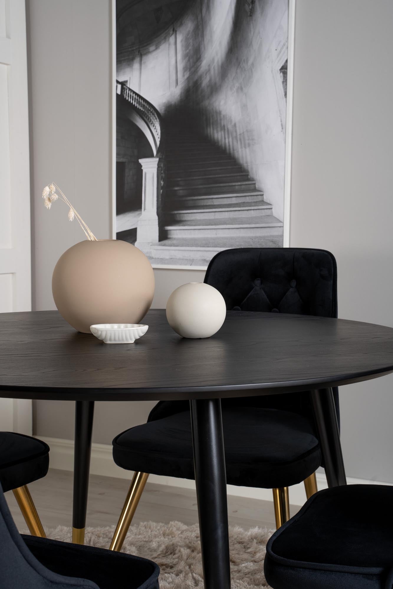 Elegantes Dipp Esszimmerset mit robustem Tisch und komfortablen Velvet-Stühlen. Perfekt für gesellige Runden und stilvolle Anlässe.