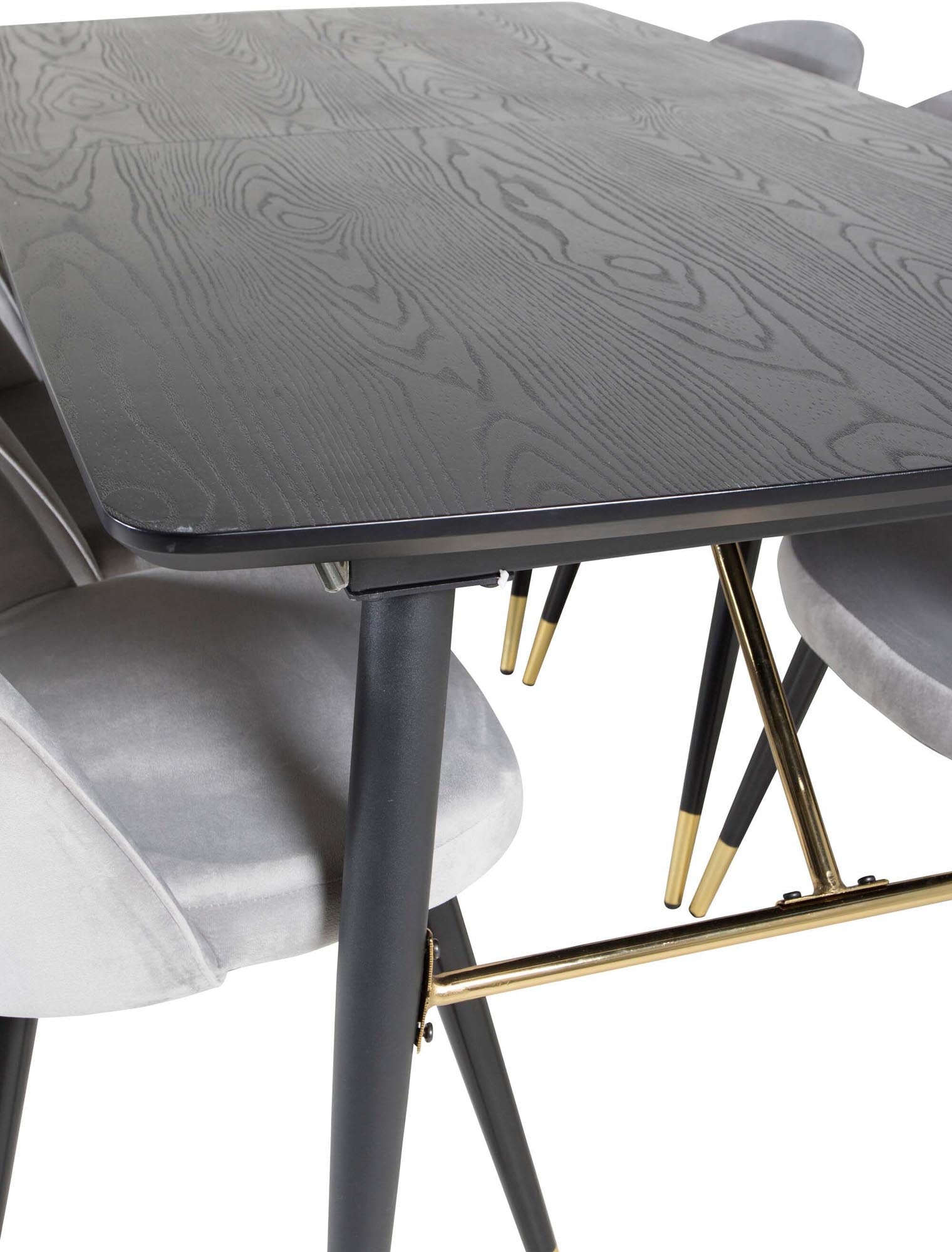 Elegantes Gold Esszimmerset mit ausziehbarem Tisch und luxuriösen Samt-Stühlen. Ideal für gesellige Runden und stilvolle Dinner.