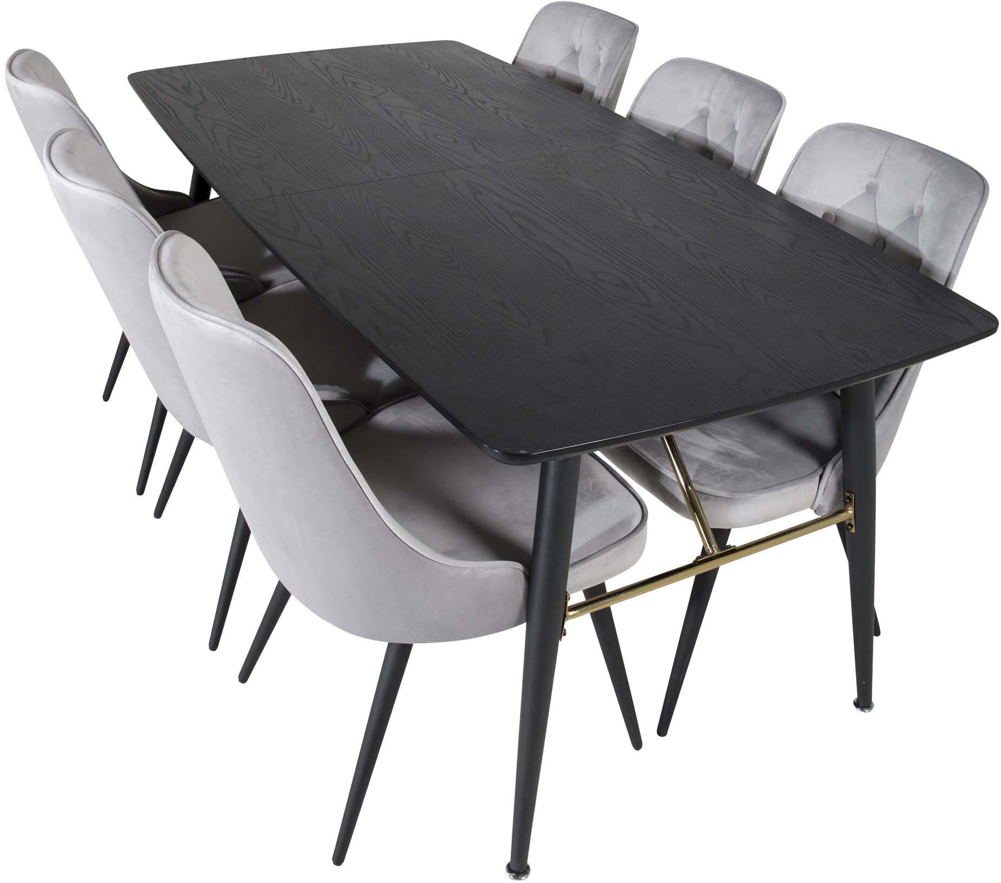 Luxuriöses Esszimmerset mit ausziehbarem Tisch und Samtstühlen.