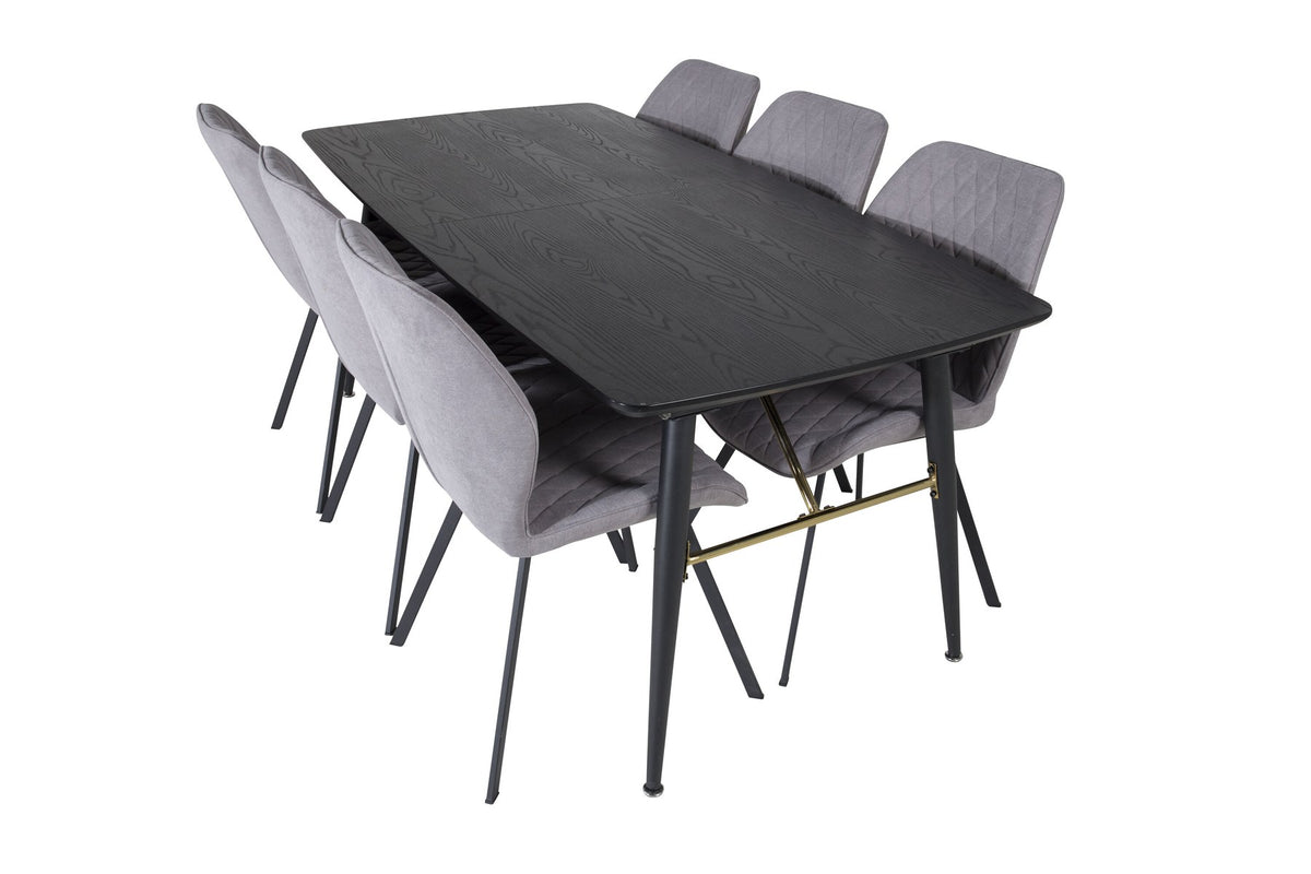 Rechteckiger Esstisch mit schwarzer MDF-Platte und Stahlbeinen, daneben zwei graue Stühle mit schwarz pulverbeschichtetem Stahlgestell.
