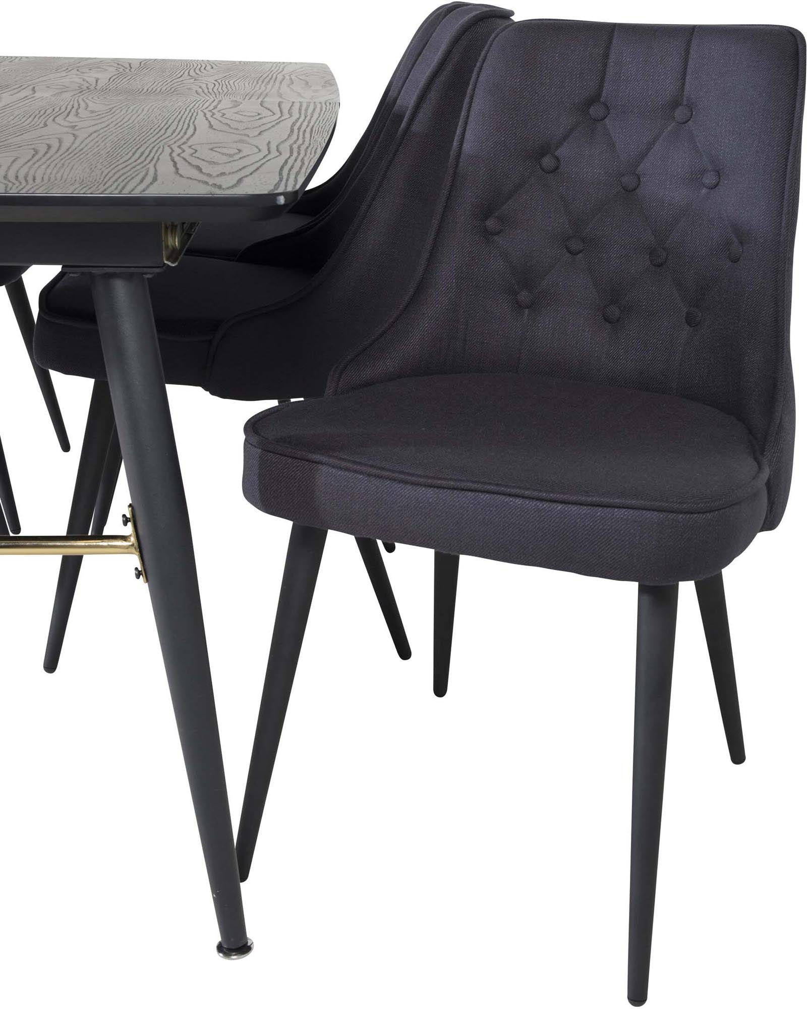 Stilvolles Esszimmerset mit ausziehbarem Tisch und Samtstühlen.