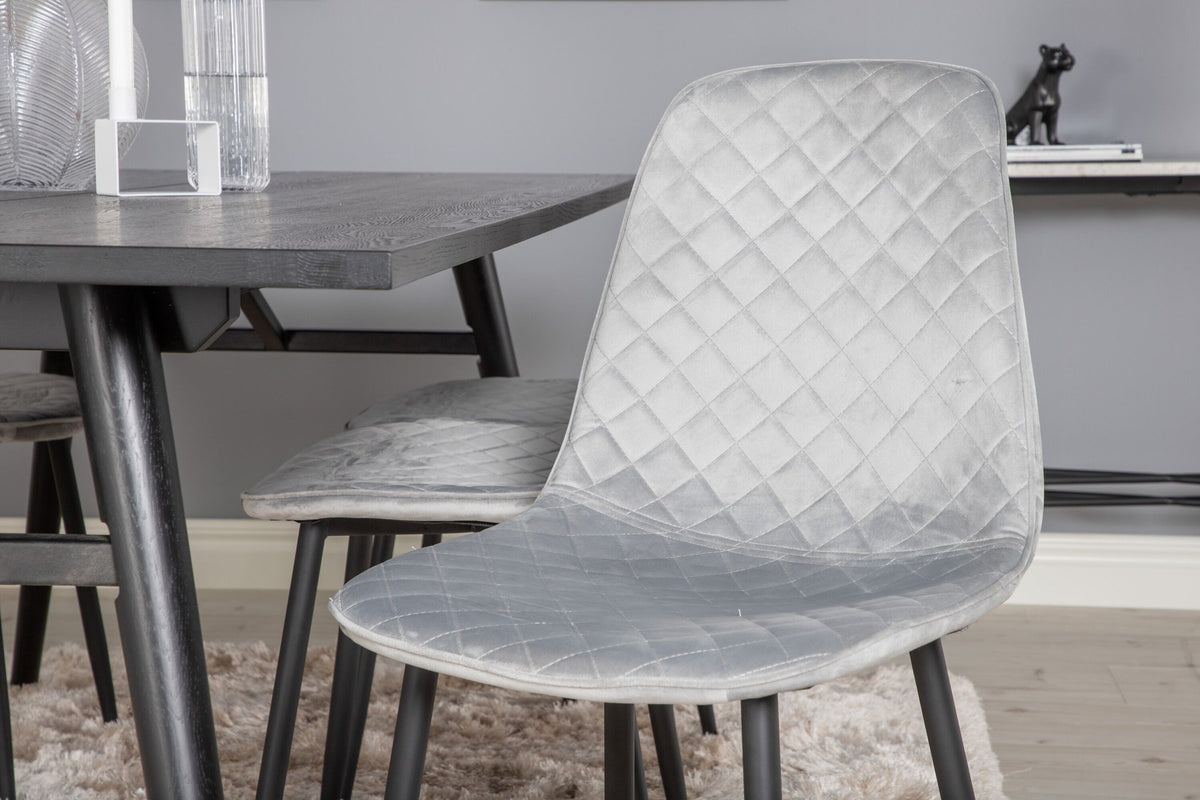 Esszimmerset Sleek & Polar: ausziehbarer Esstisch mit schwarzer Eichenplatte und Stahlbeinen, sechs Stühle mit schwarzem Samtbezug und Stahlgestell.